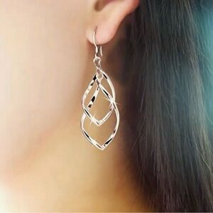 Elegant Silver Twisted Drop Earrings